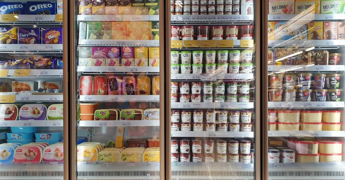 freezers having frozen food inside store 