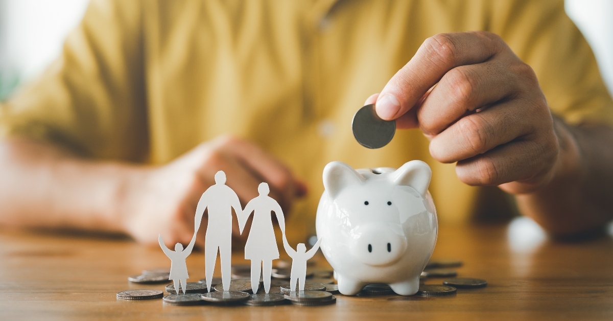 putting coin on the piggybank