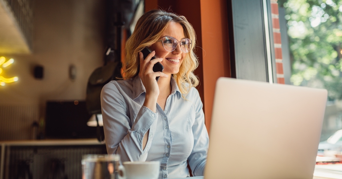sitting in cafe using phone