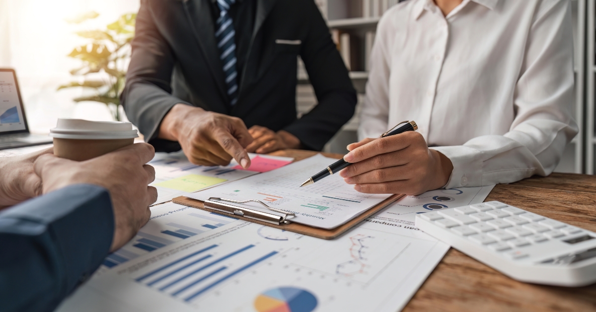 businesspeople discuss investment project