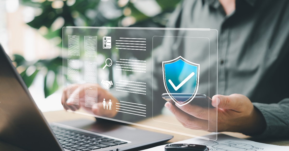 businessman checking quality controls using laptop