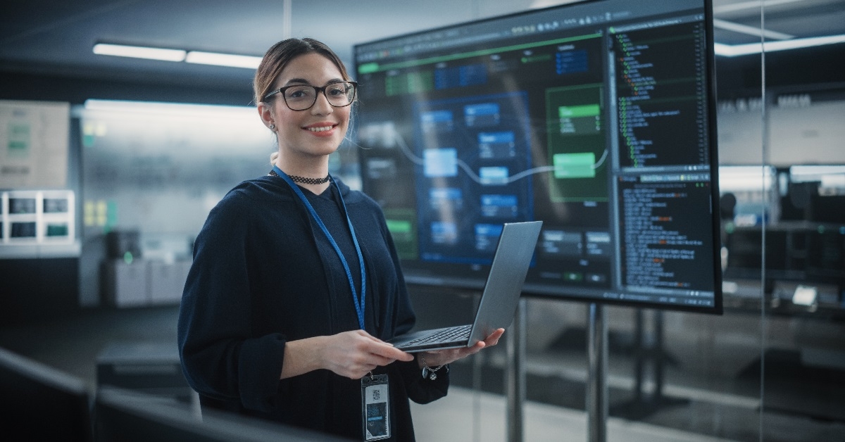 confident female web developer at work