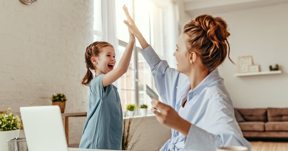 Happy woman giving high five