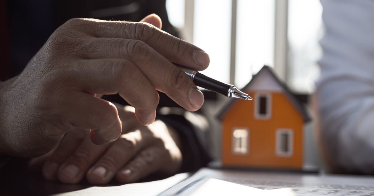 Mortgage advisor explaining policies to client