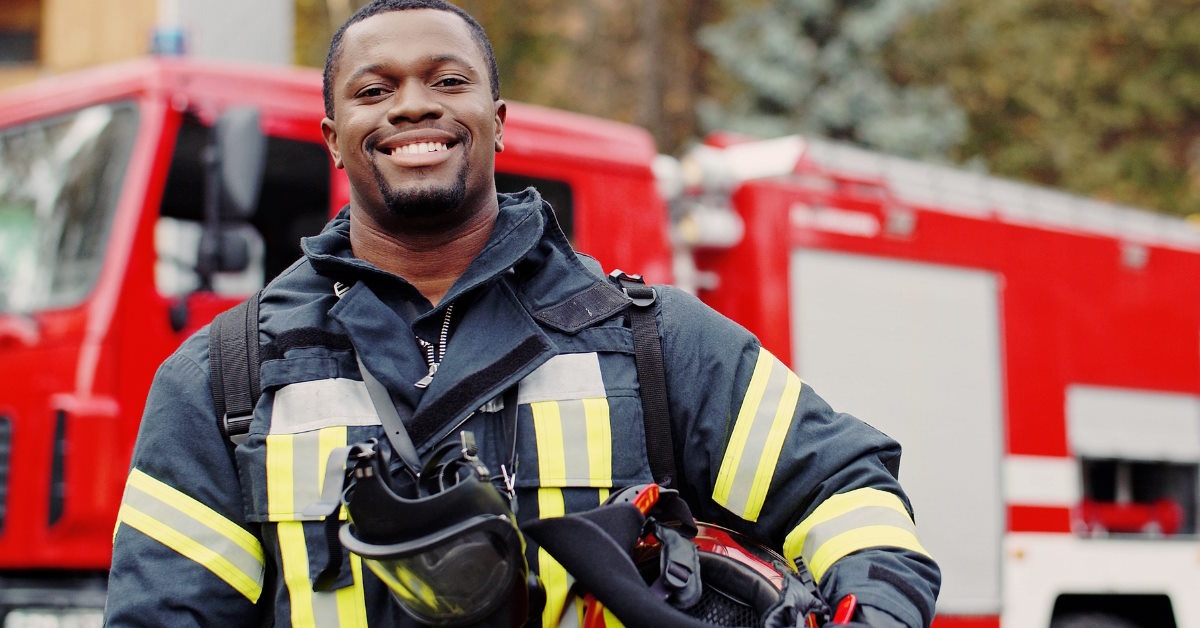 confident firefighter smiling outdoor