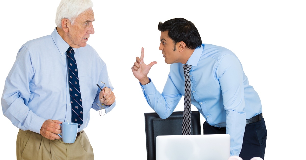 Businessmen having feud at work