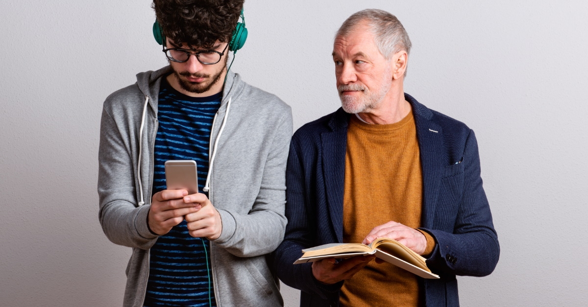 Father staring son showing generation gap