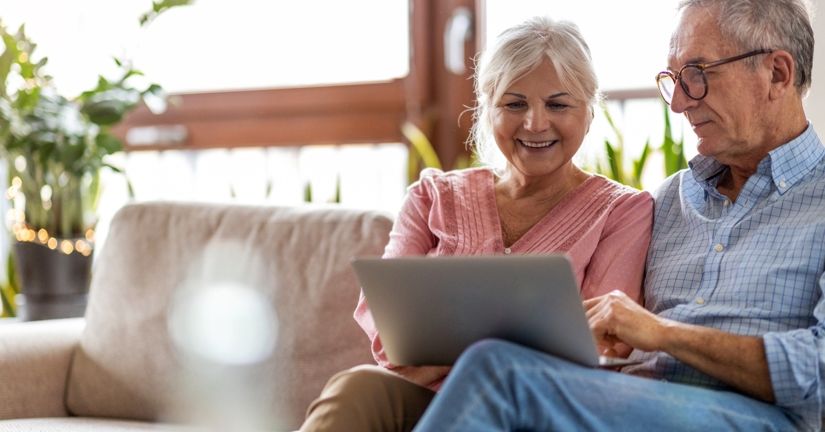 Mature couple using a laptop