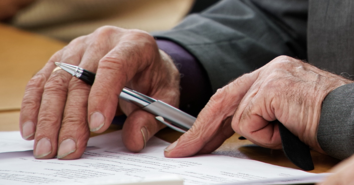 Senior filling out form