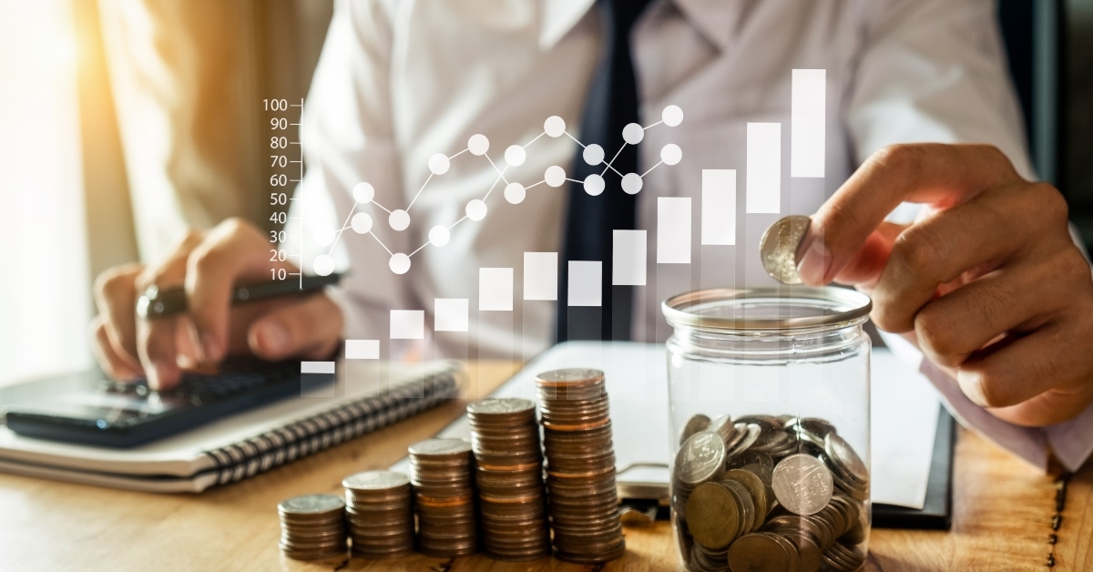 businessman holding coins