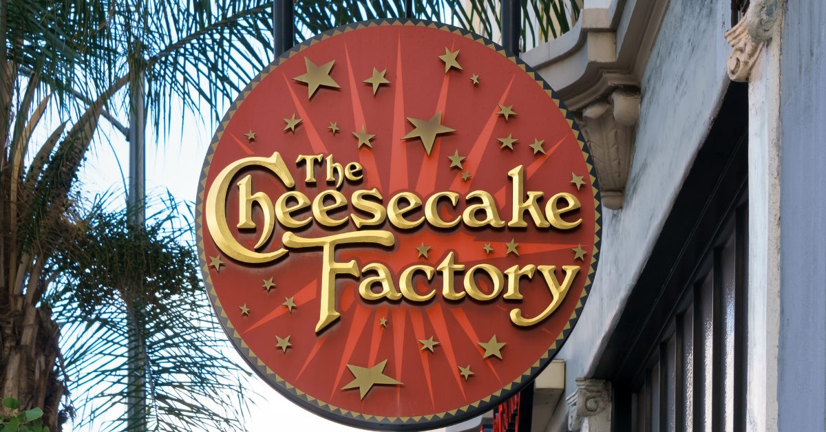 cheesecake factory sign board in street