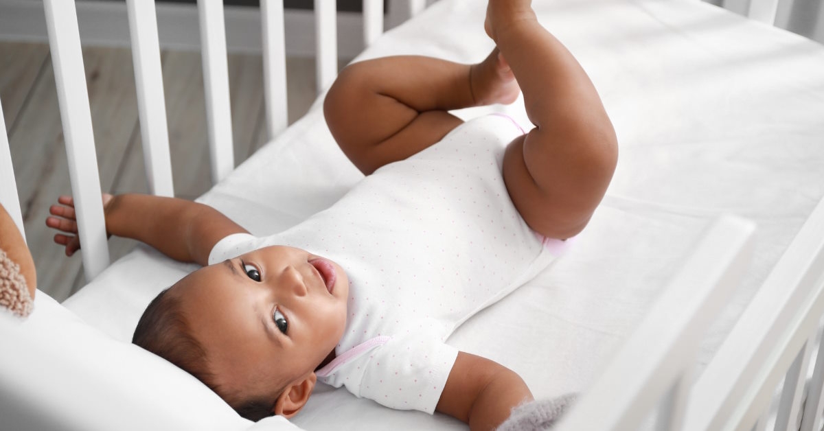 A baby in a crib