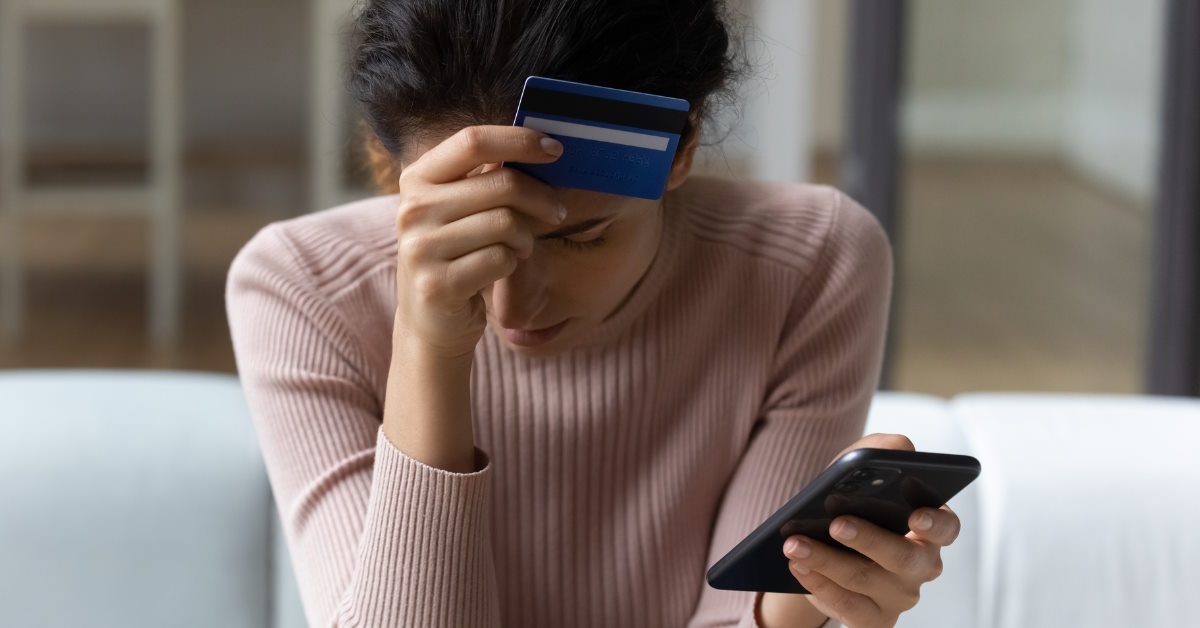 woman frustrated after getting scammed online