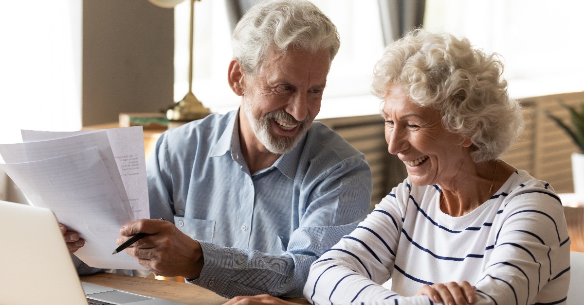 Couple jointly calculating their domestic incomes.