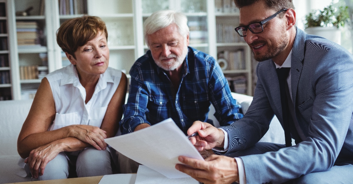 financial advisor guiding couple about investments