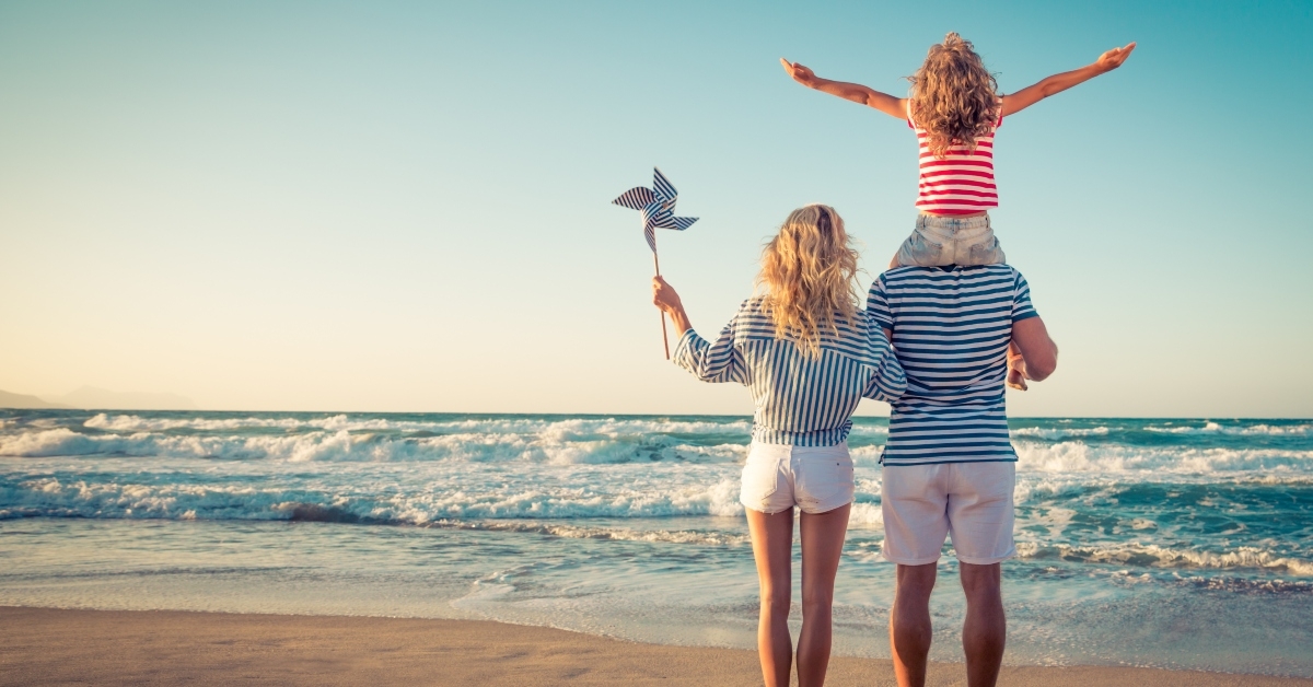 Family having fun on the beach