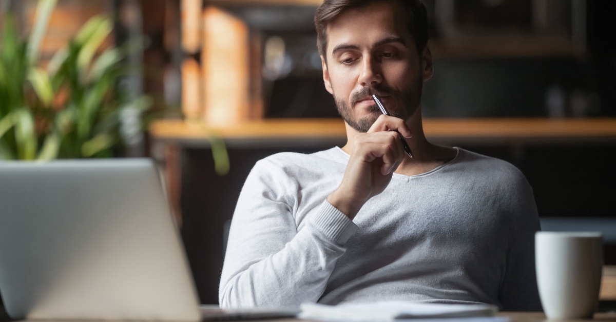 Man looking at laptop
