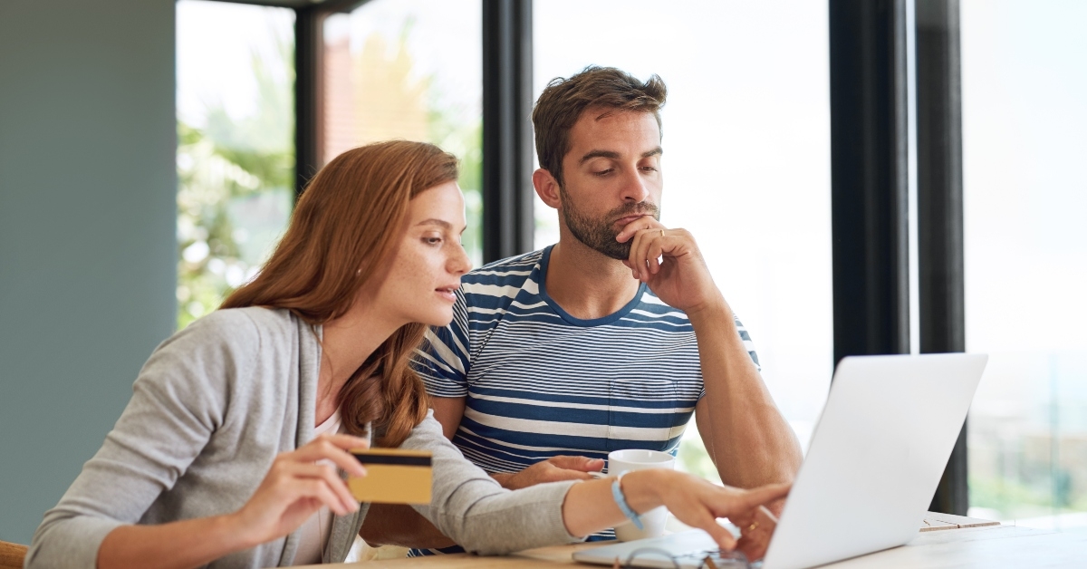 Couple working on household budget