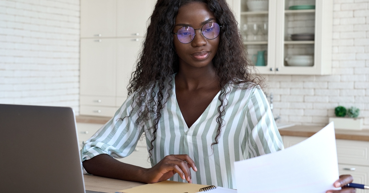 woman looking at paperwork