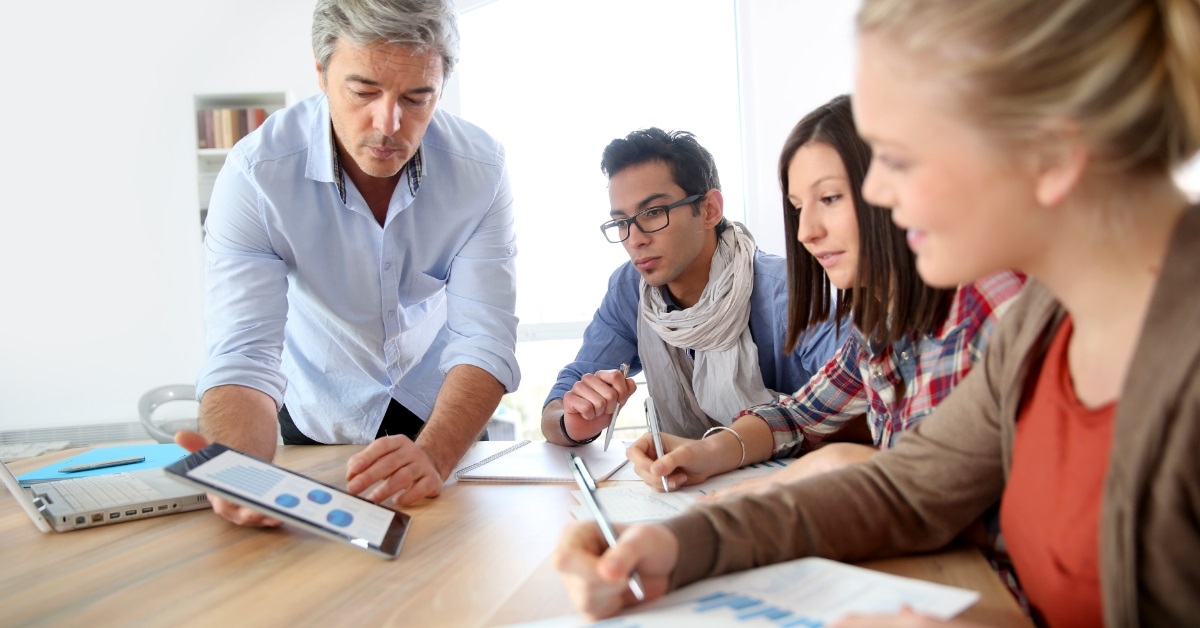 professor teaching marketing strategies to students