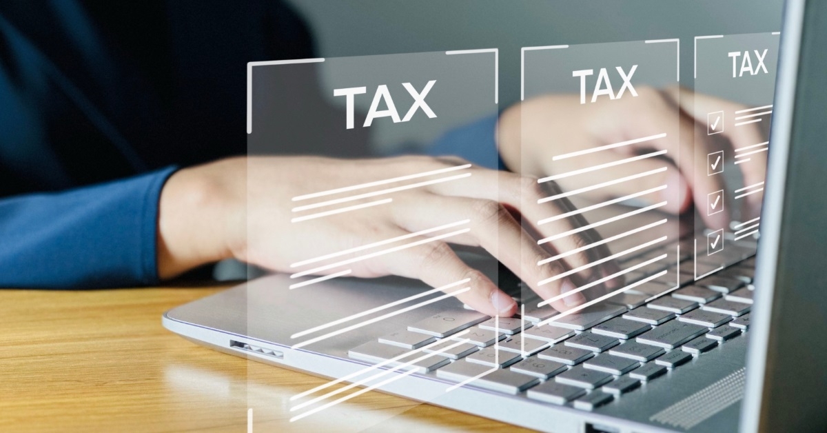 woman filling out annual taxes online