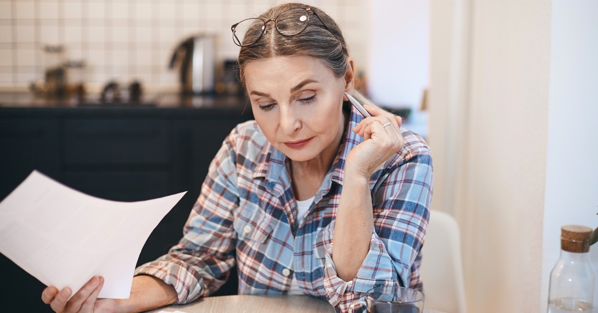 woman pensioner studying Spanish