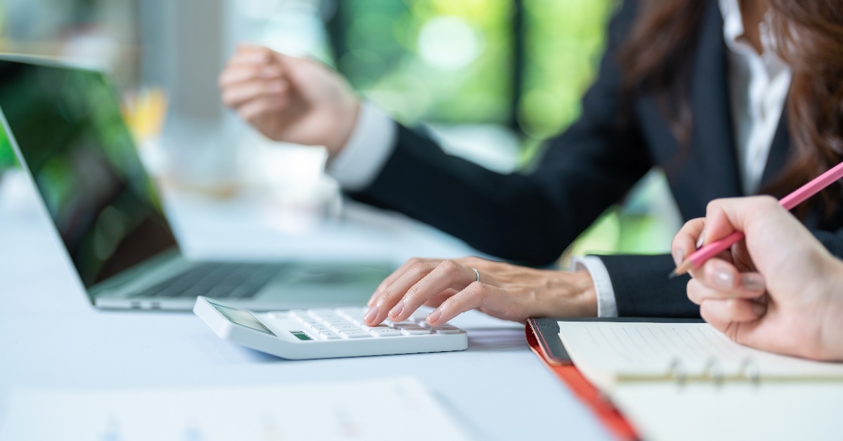 female accountant analyzing data on laptop