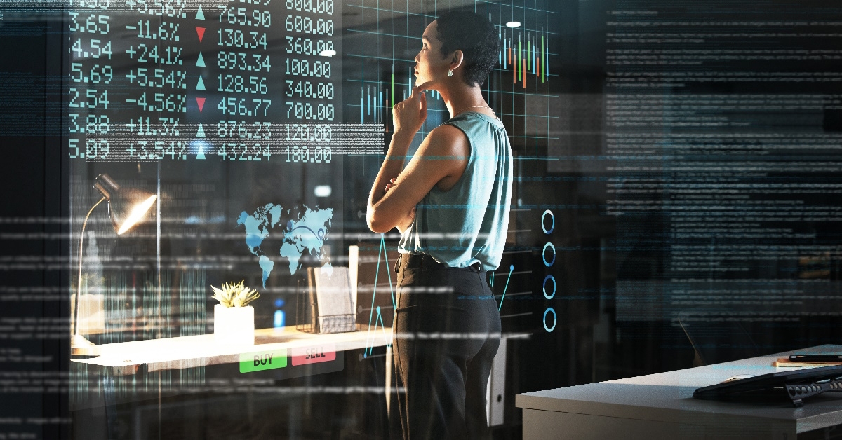 female broker checking out stock market