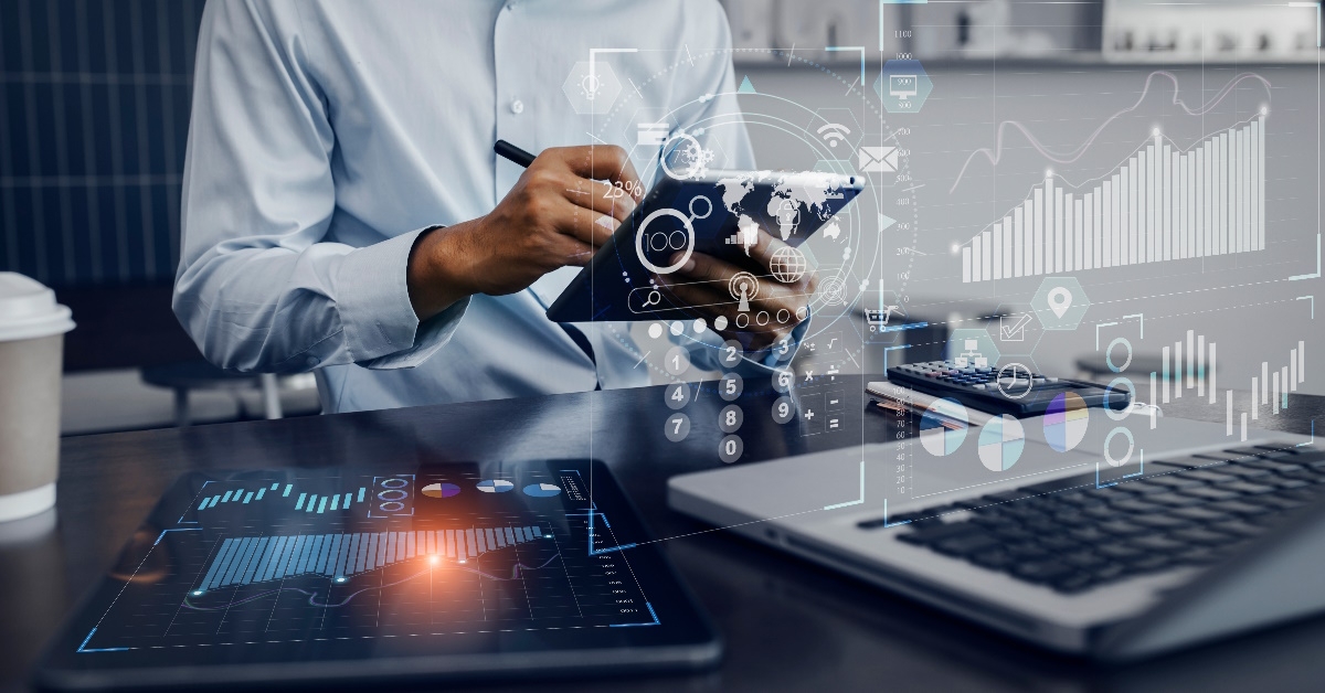 finance manager using tablet at work