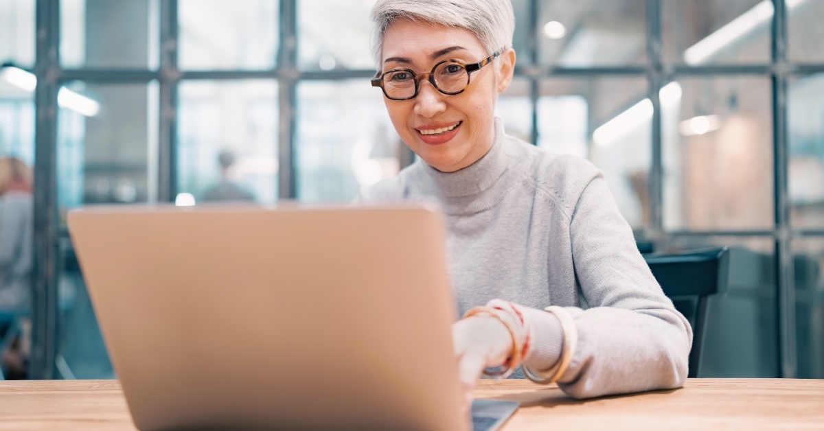 senior businesswoman using laptop working