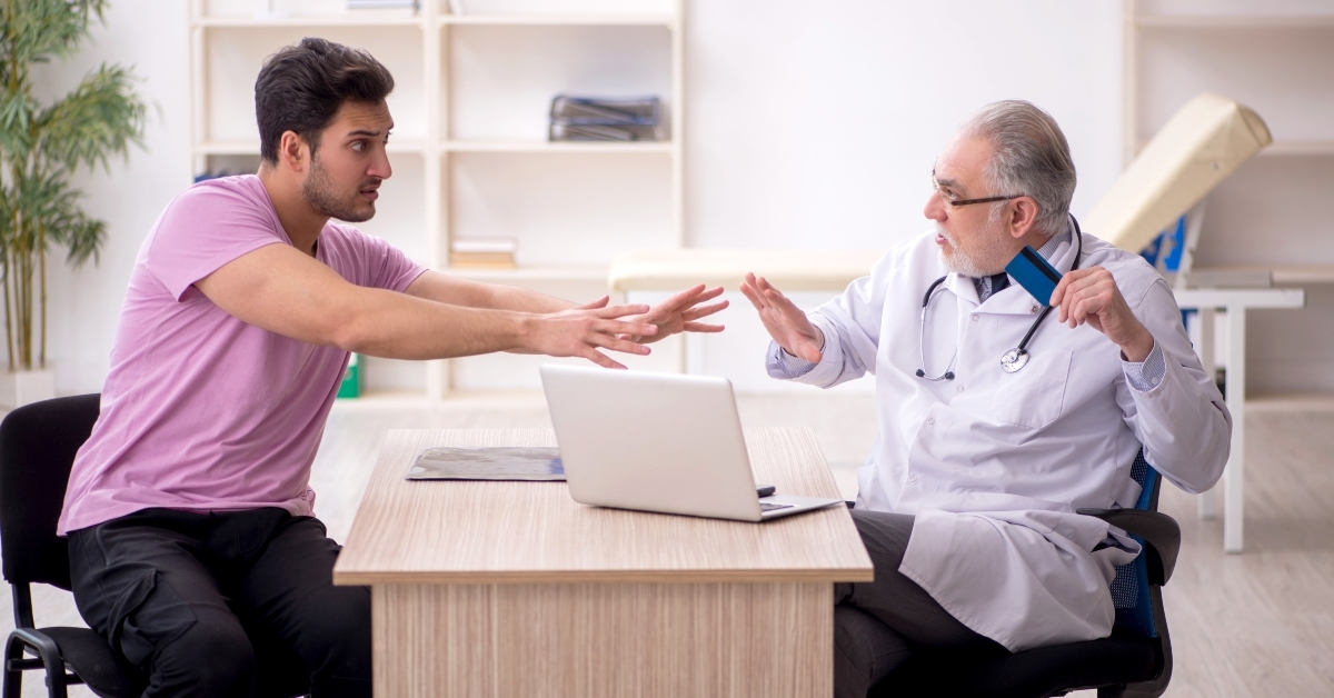 patient visiting old male doctor