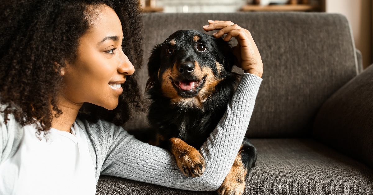 african american woman with dog