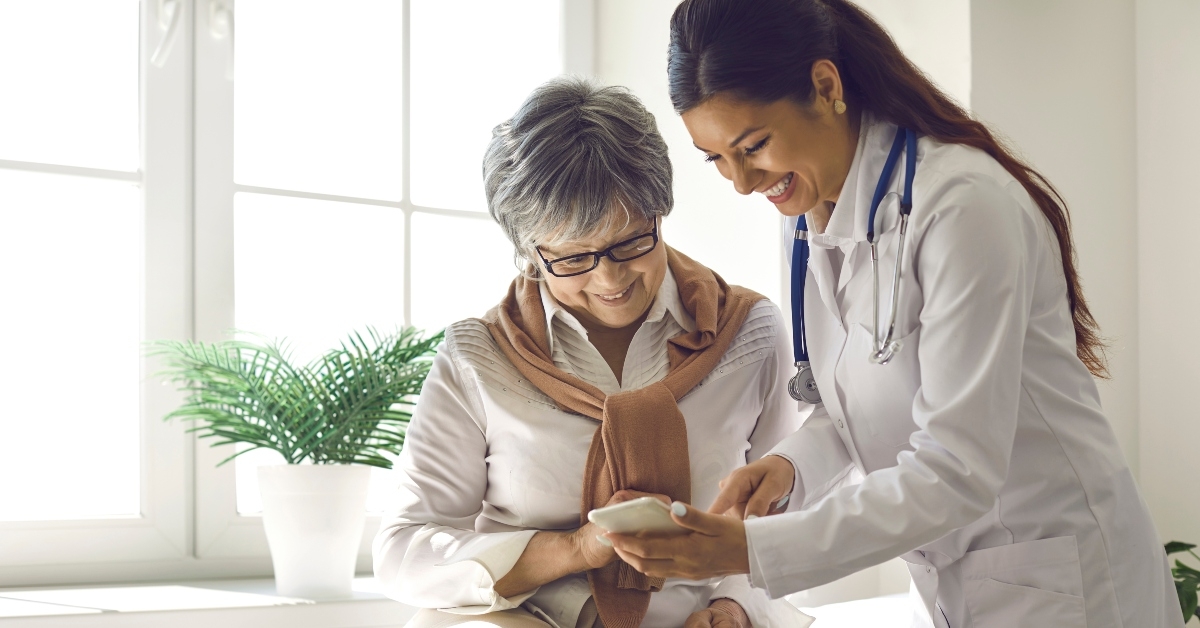 caring doctor teaches female patient