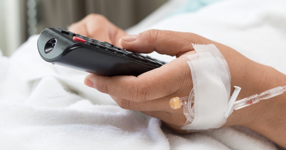 female patient watching tv