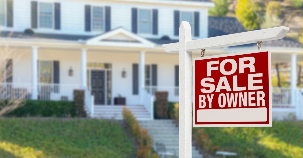 for sale sign outside house