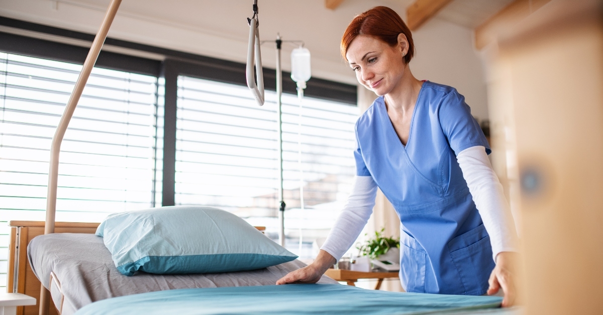 housekeeping staff changing sheets