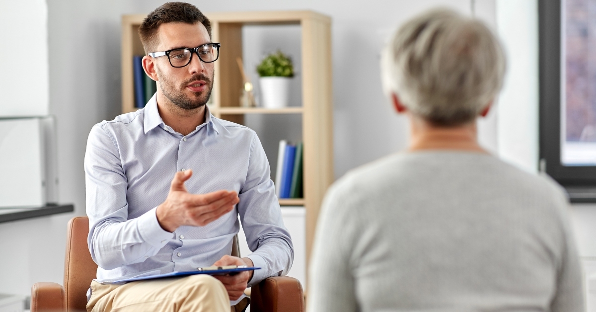 psychologist talking to senior woman