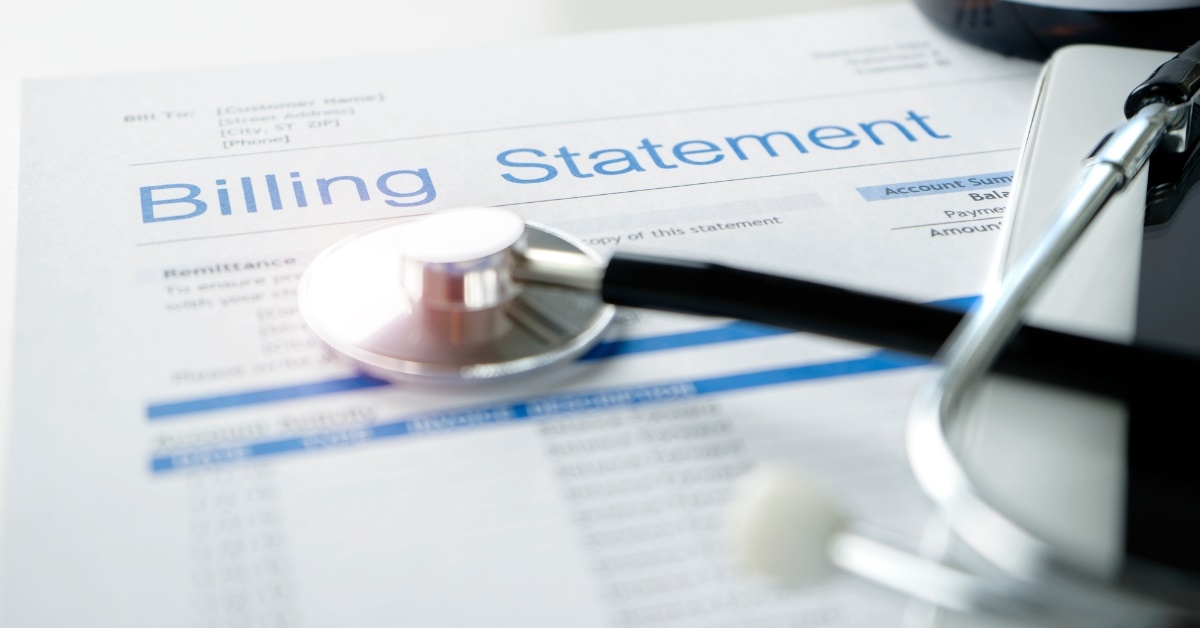 stethoscope over healthcare billing statement 