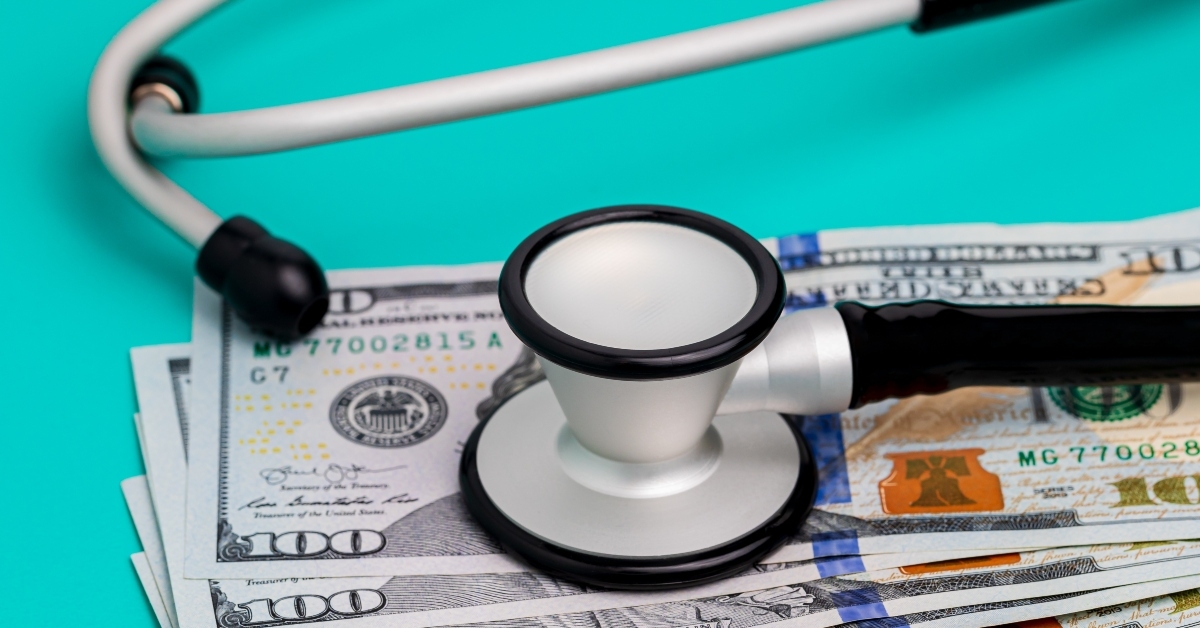 stethoscope and cash money