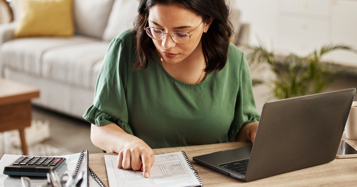 woman with laptop in home office