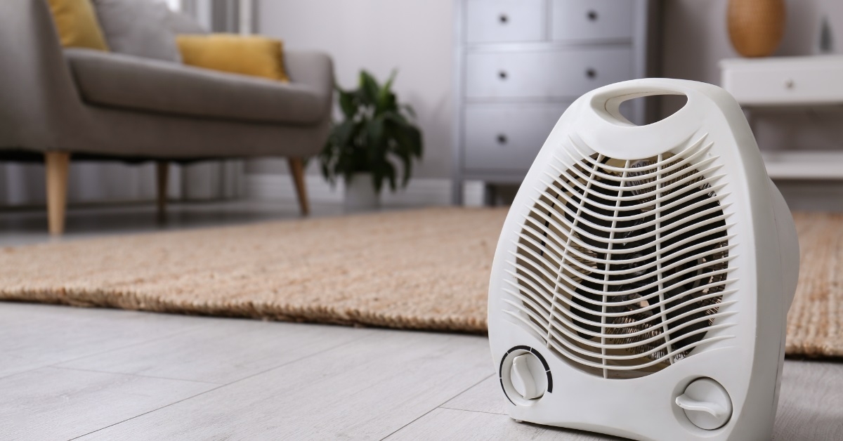 modern electric fan heater on floor