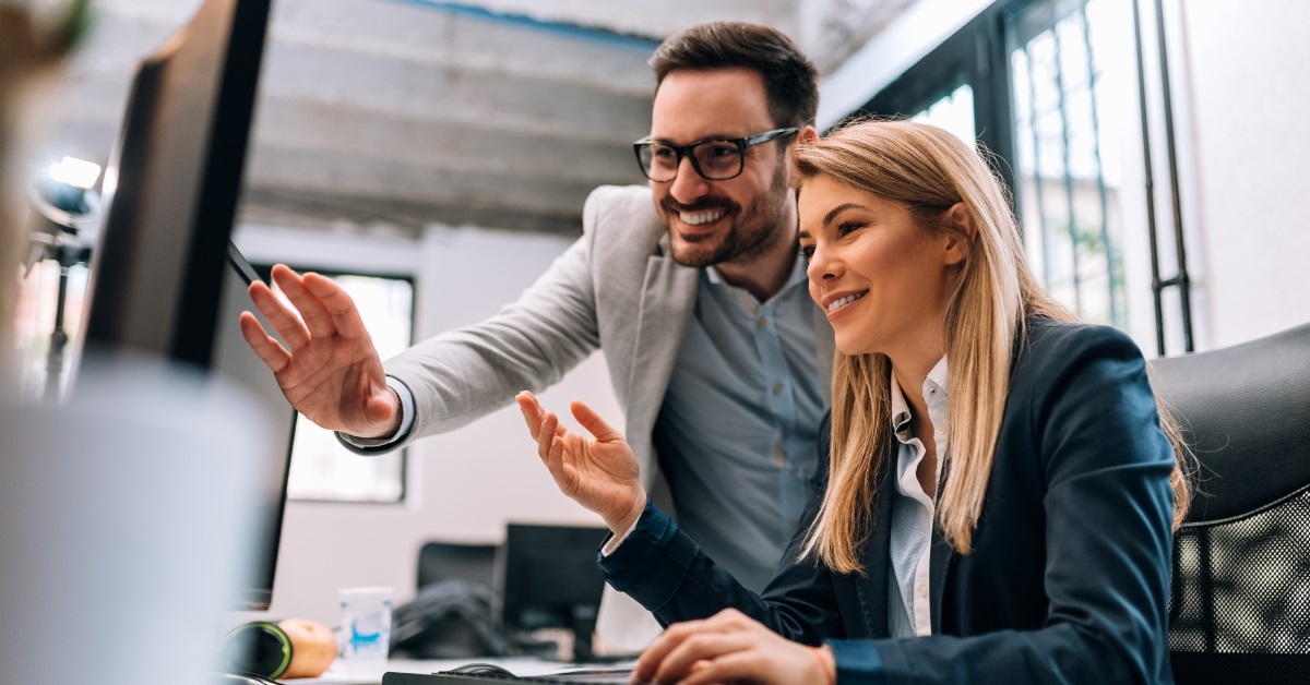 happy colleagues working on project together