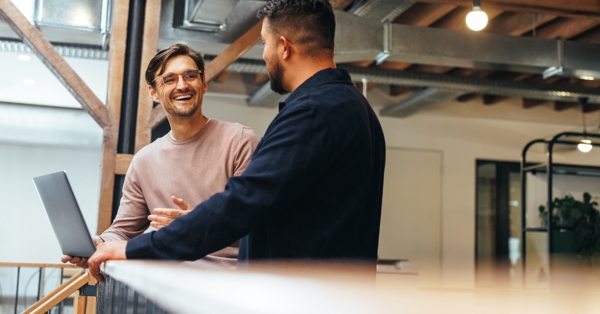businessmen talking to each other
