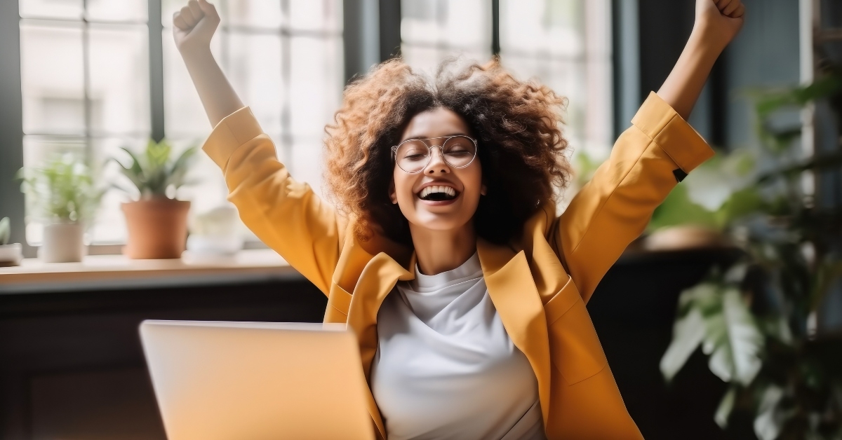 entrepreneur smiling and rejoices in victory