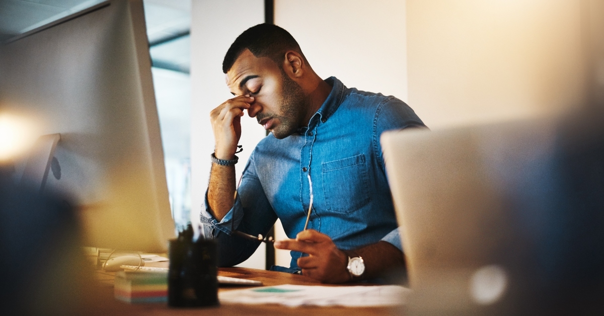 tired businessman with headache