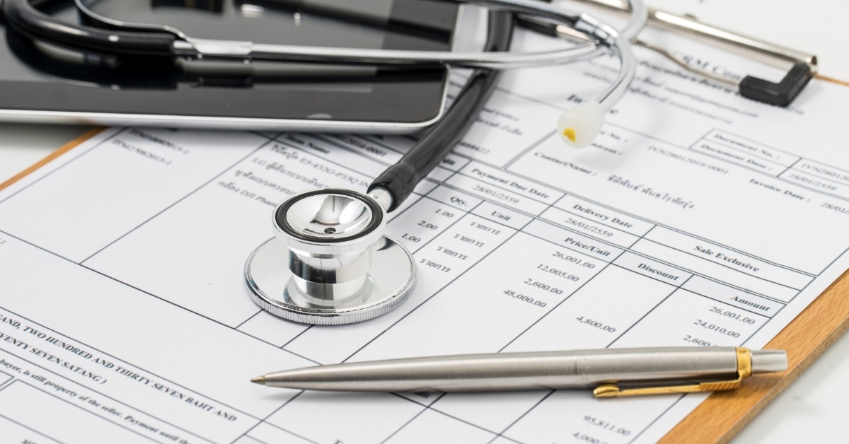 stethoscope on medical billing statement 