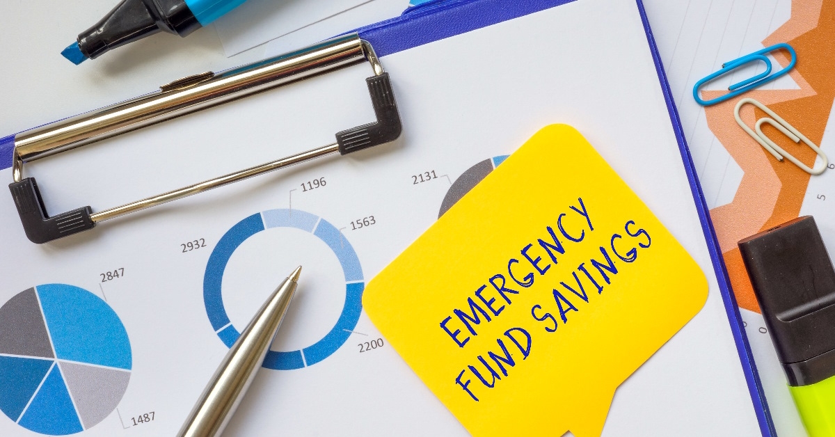 emergency fund savings note on clipboard