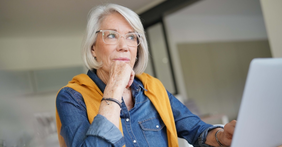 Senior woman working on laptop