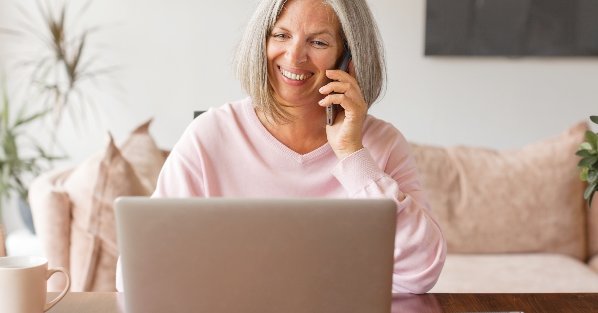 senior woman working using laptop