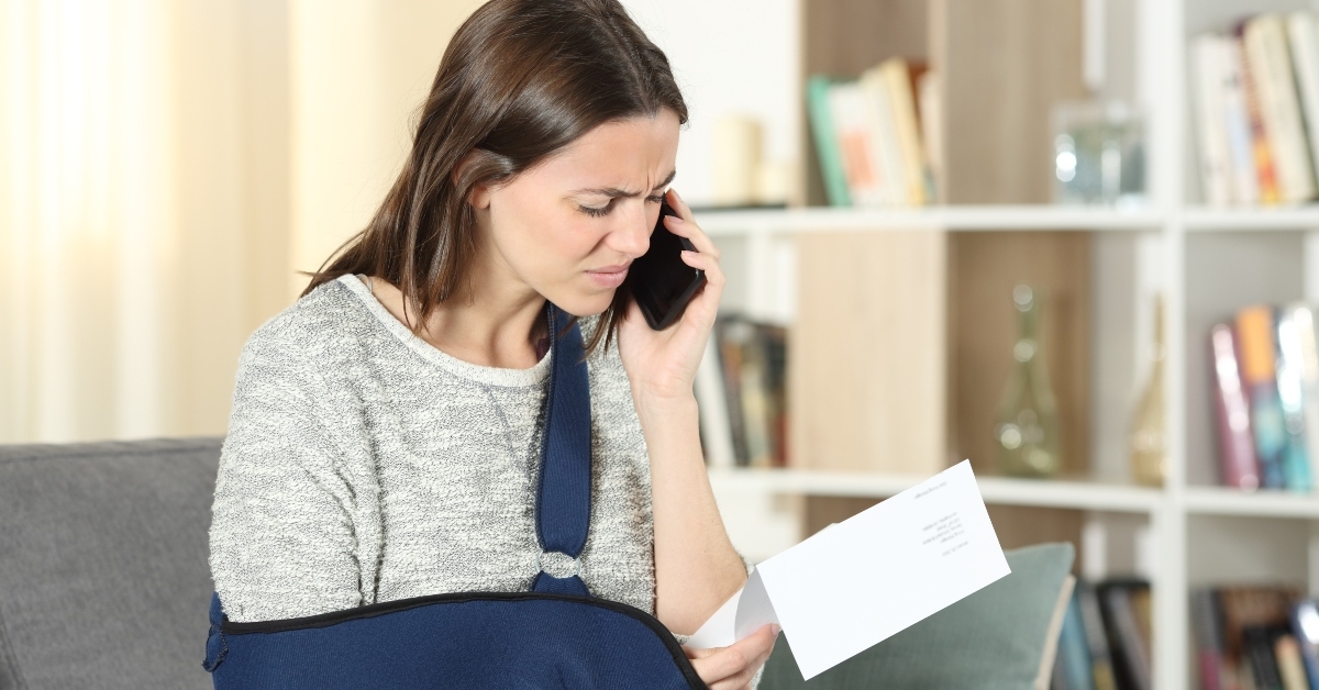 sad disabled woman claiming on phone